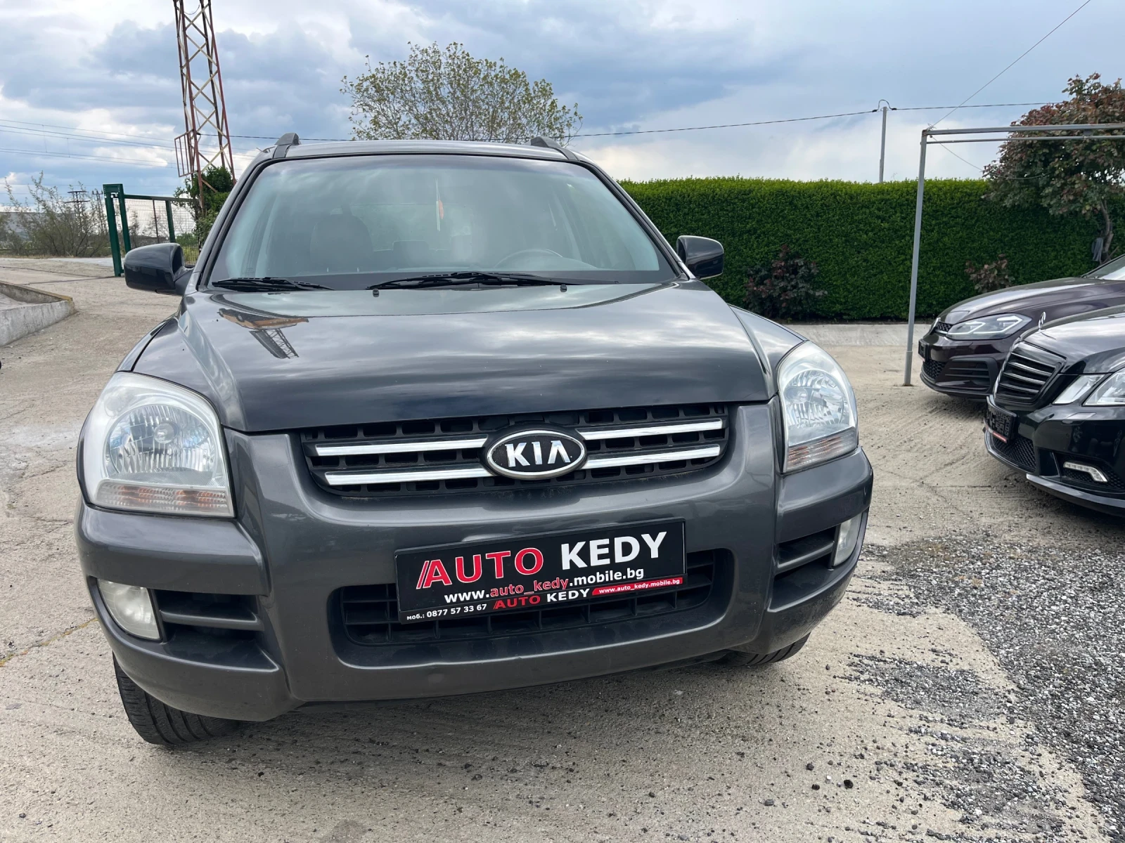Kia Sportage 2.0i 4WD, снимка 2 - Автомобили и джипове - 54391405
