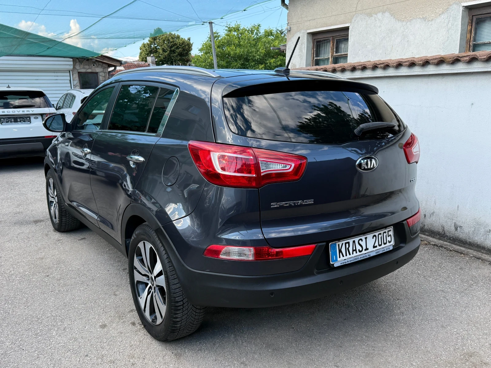 Kia Sportage 2.0CRDI 4X4 NAVI XENON , снимка 4 - Автомобили и джипове - 54976668