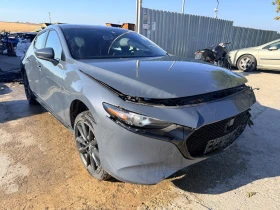 ������ Mazda 3