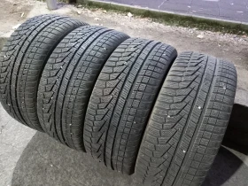 Гуми Зимни 235/45R18, снимка 1 - Гуми и джанти - 47997984