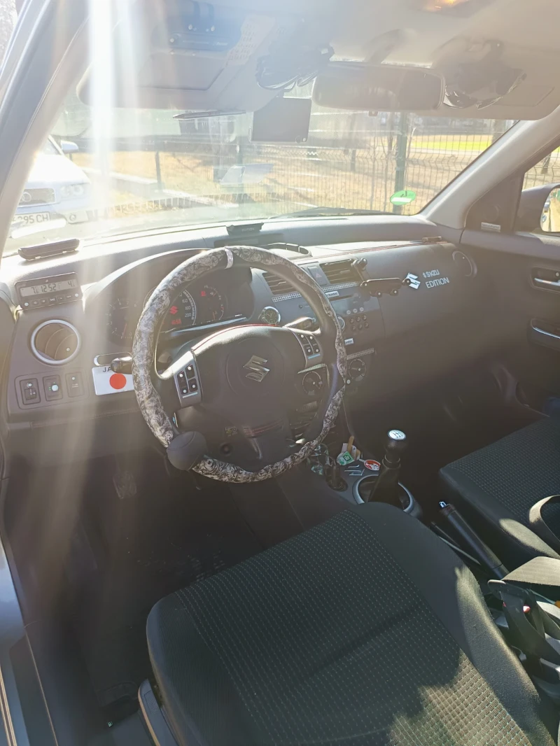Suzuki Swift 1.3 benzin gaz inj, снимка 13 - Автомобили и джипове - 52373061