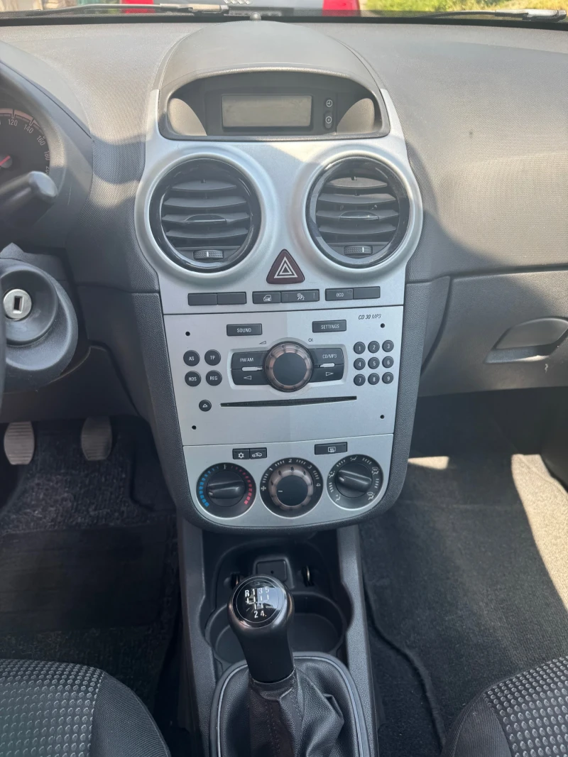Opel Corsa, снимка 8 - Автомобили и джипове - 52251880