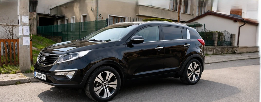 Kia Sportage 2.0i/АВТОМАТ/4X4, снимка 3 - Автомобили и джипове - 54552693