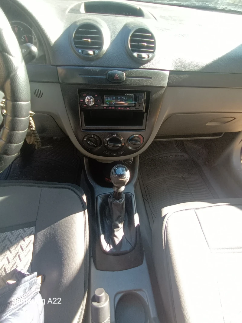 Daewoo Lacetti 1.6 I, снимка 12 - Автомобили и джипове - 47902754