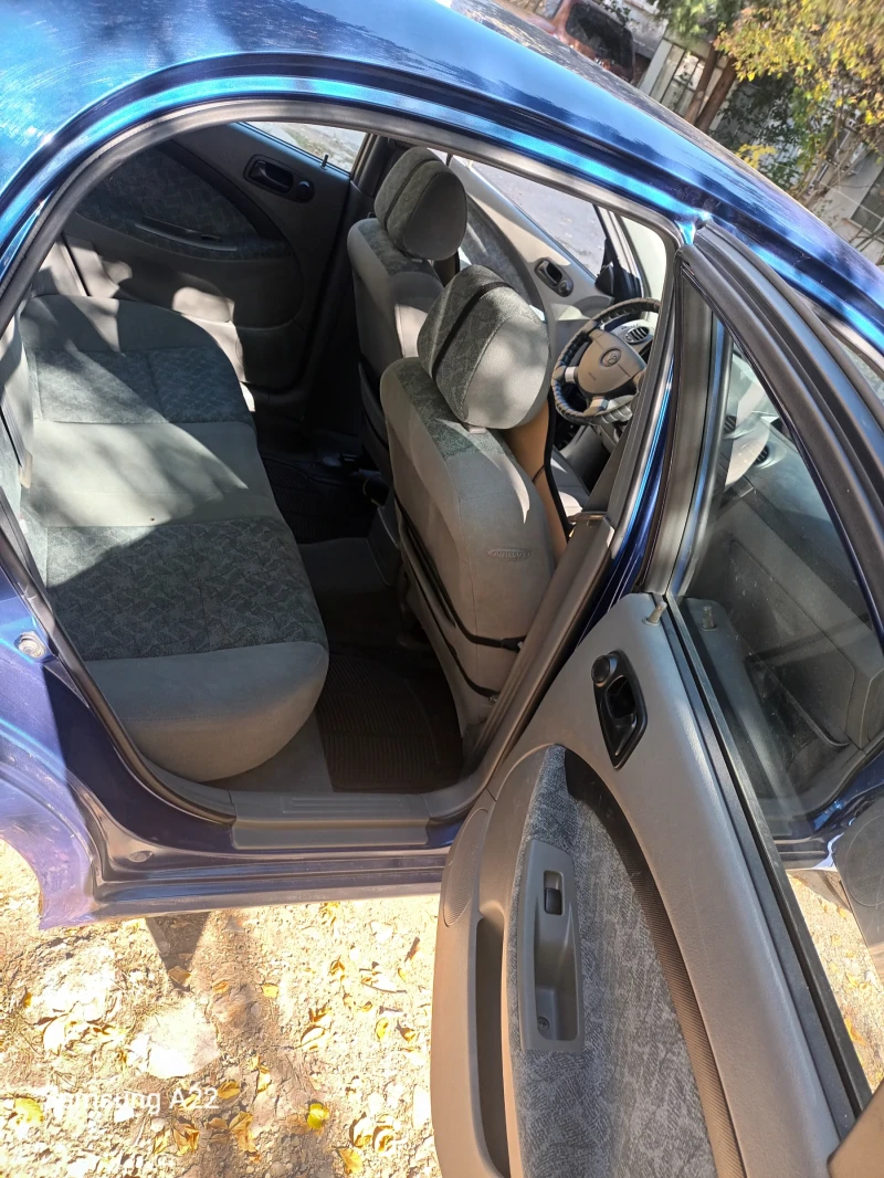 Daewoo Lacetti 1.6 I, снимка 9 - Автомобили и джипове - 47902754