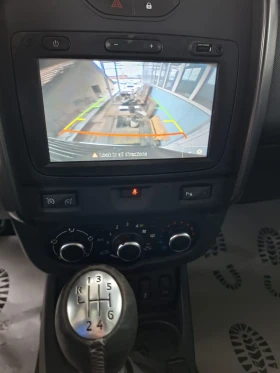 Dacia Duster 1.6I 4x4 Navi - 9300 € / 18189.22 лв. - 96070779 13