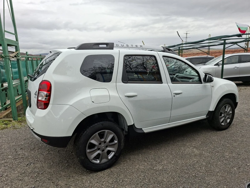 Dacia Duster 1.6I 4x4 Navi, снимка 4 - Автомобили и джипове - 53111634