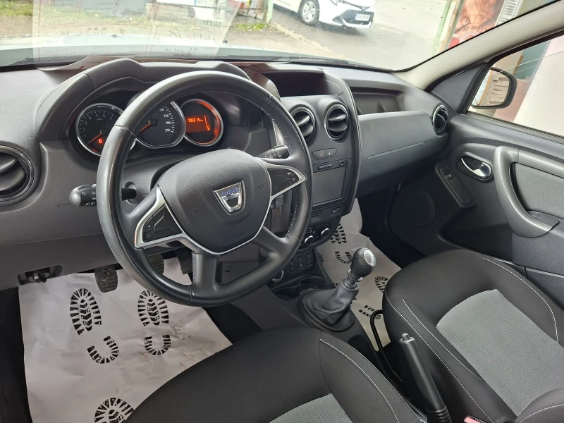 Dacia Duster 1.6I 4x4 Navi, снимка 10 - Автомобили и джипове - 53111634