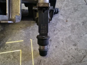 25313846 дюза бензин OPEL 