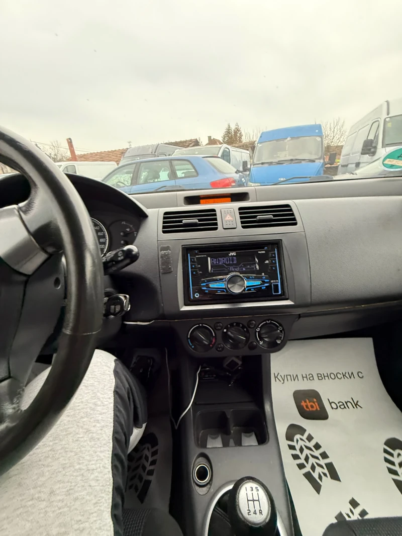 Suzuki Swift 1.3i КЛИМАТИК, снимка 14 - Автомобили и джипове - 52717612