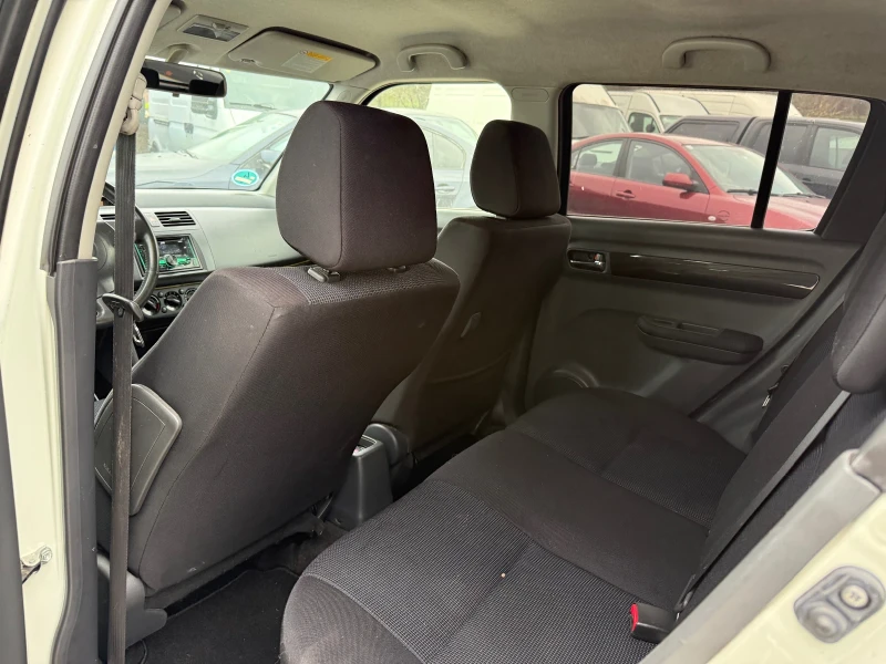 Suzuki Swift 1.3i КЛИМАТИК, снимка 11 - Автомобили и джипове - 52717612