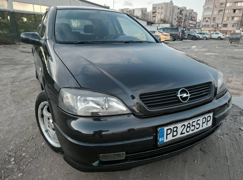Opel Astra 1.6, снимка 11 - Автомобили и джипове - 53100330