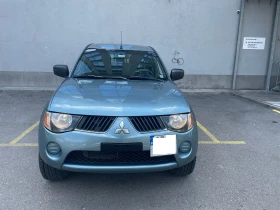 Mitsubishi L200 2.5, TDI, 136кс петфектен - 10000 € / 19558.30 лв. - 36149354 3
