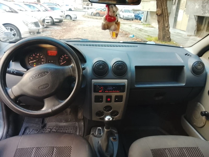 Dacia Logan, снимка 5 - Автомобили и джипове - 52535643