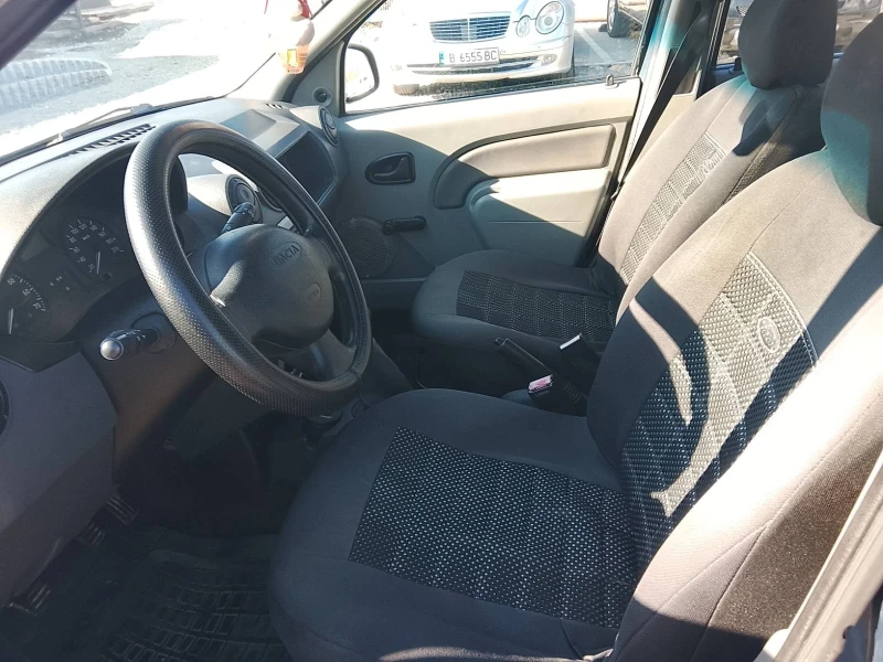 Dacia Logan, снимка 9 - Автомобили и джипове - 52535643