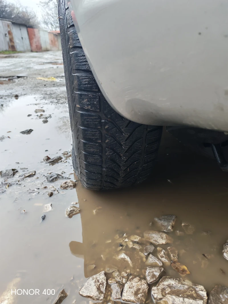 Hyundai Tucson 2.0  CRDI, снимка 7 - Автомобили и джипове - 52668678