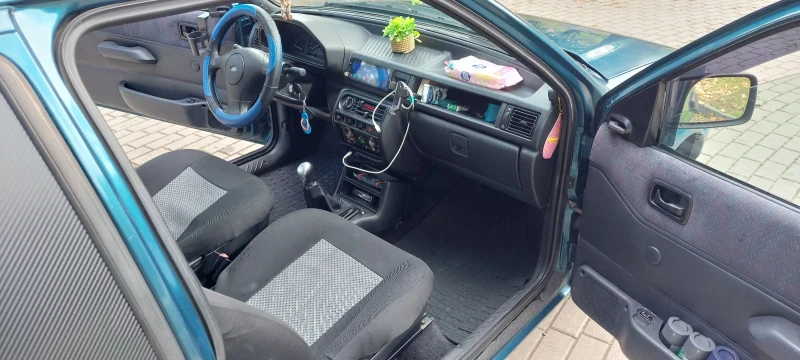 Ford Fiesta 1.1/50HP/Cayman Blue !, снимка 11 - Автомобили и джипове - 47343936