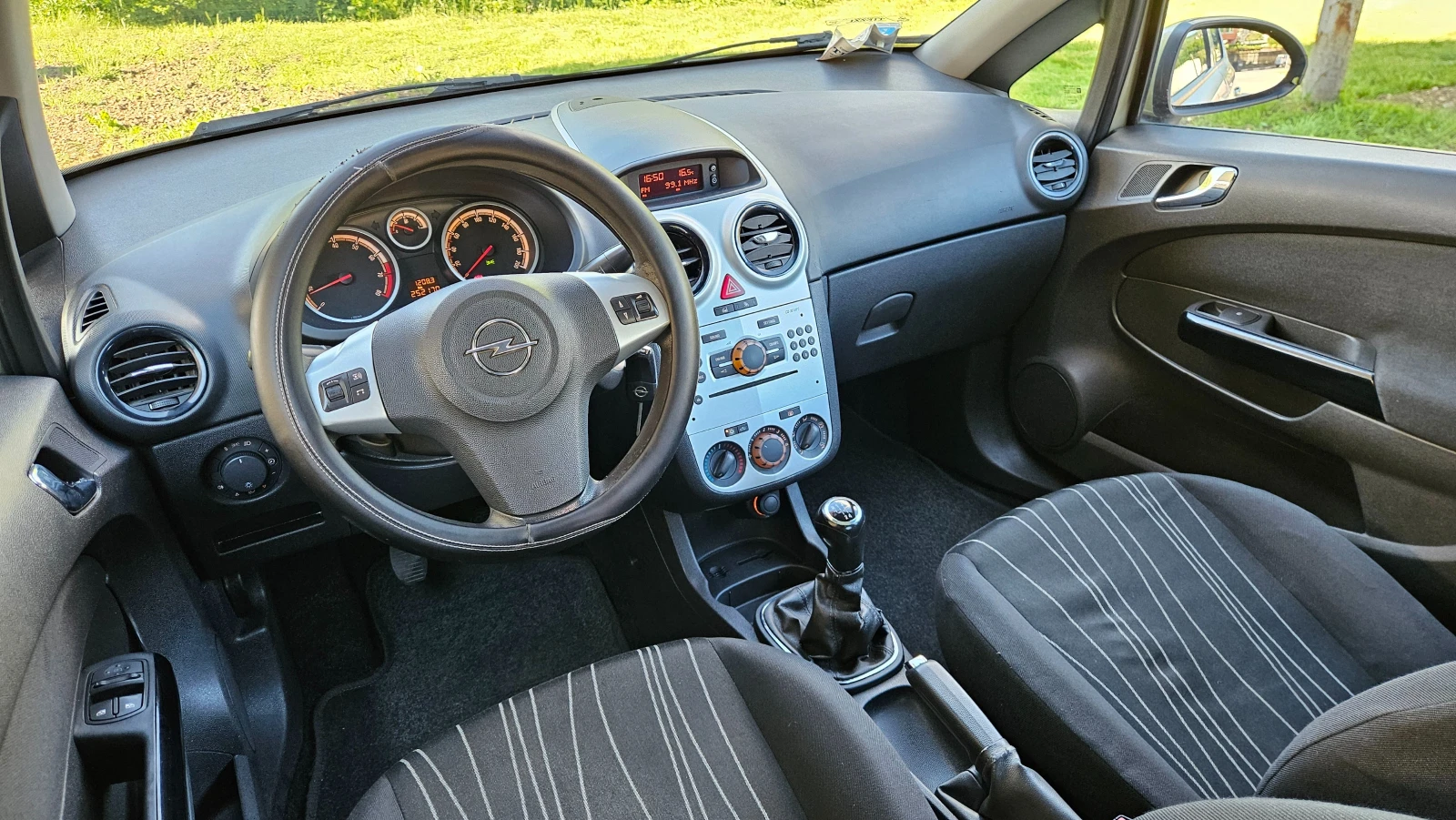Opel Corsa 1.2 Klimatik/Euro4, снимка 10 - Автомобили и джипове - 54615943
