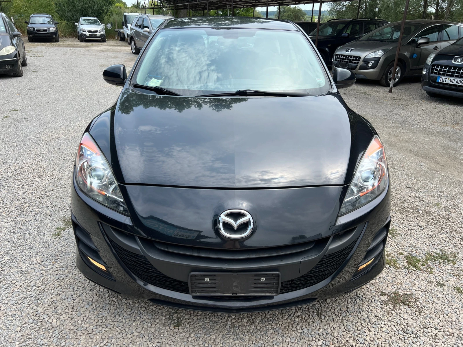 Mazda 3 1.6I - изображение 2