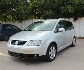    VW Touran 2.0 TDI   7   