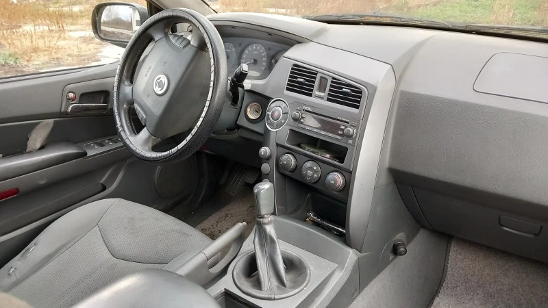 SsangYong Kyron, снимка 10 - Автомобили и джипове - 47440237