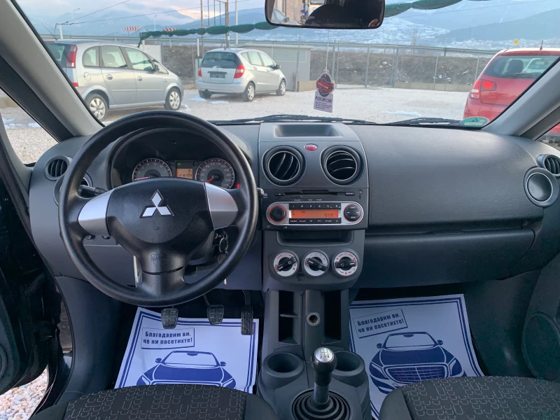 Mitsubishi Colt 1.3i 95кс, снимка 13 - Автомобили и джипове - 48706554