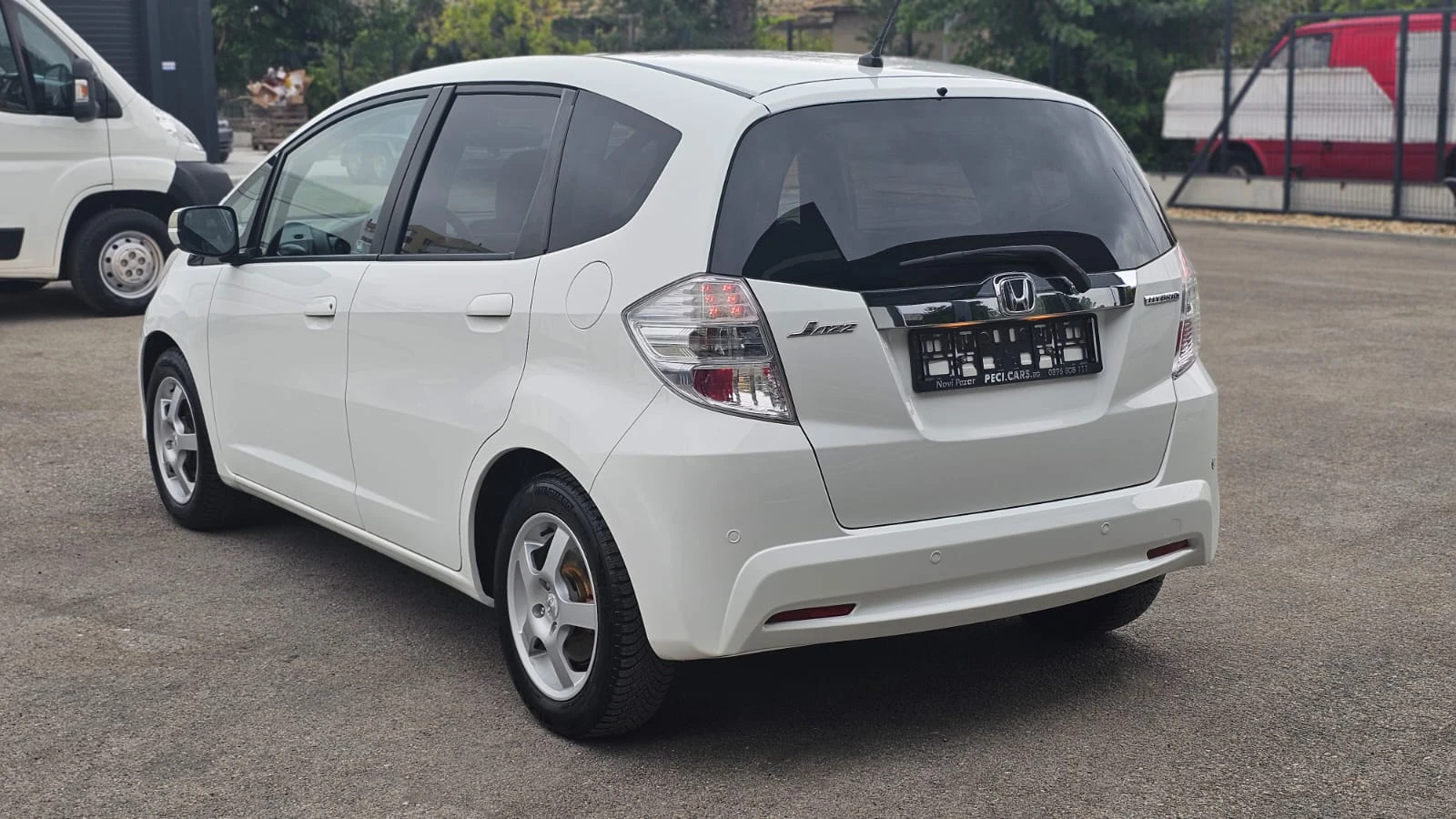 Honda Jazz 1.3IMA Mild Hybrid AUTO CH-ИСТОРИЯ-ФУЛ-ТОП СЪСТ., снимка 4 - Автомобили и джипове - 55836822