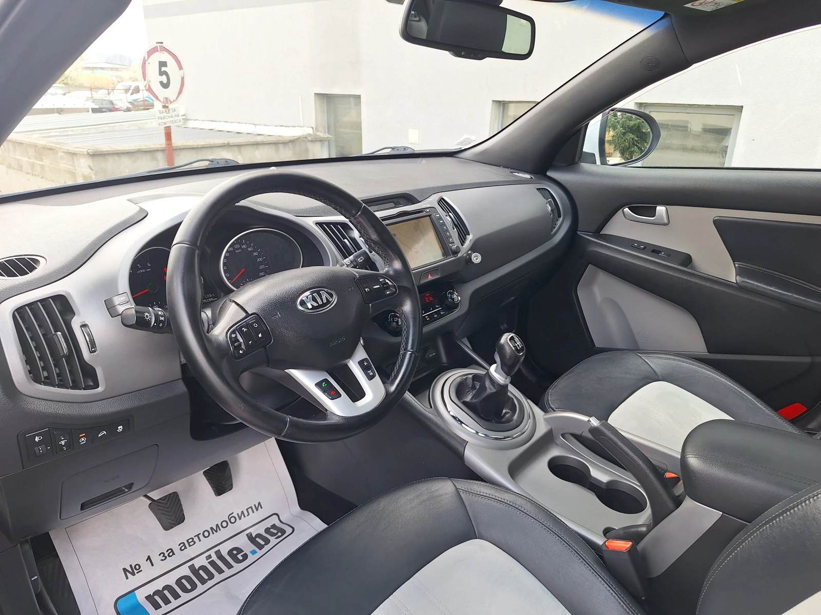 Kia Sportage 1.7D 116KC NAVI, снимка 12 - Автомобили и джипове - 54032112