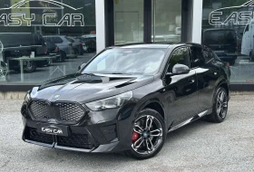 ������ BMW iX2