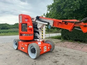      JLG E300AJP 11M.