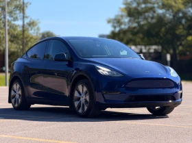 ������ Tesla Model Y