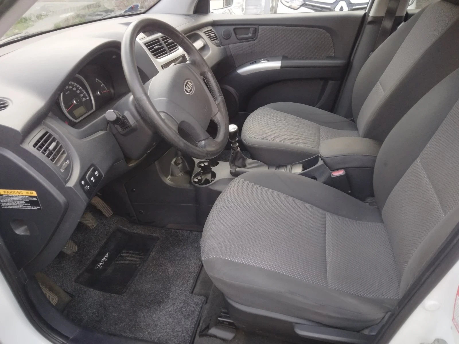 Kia Sportage 2.0 - изображение 8