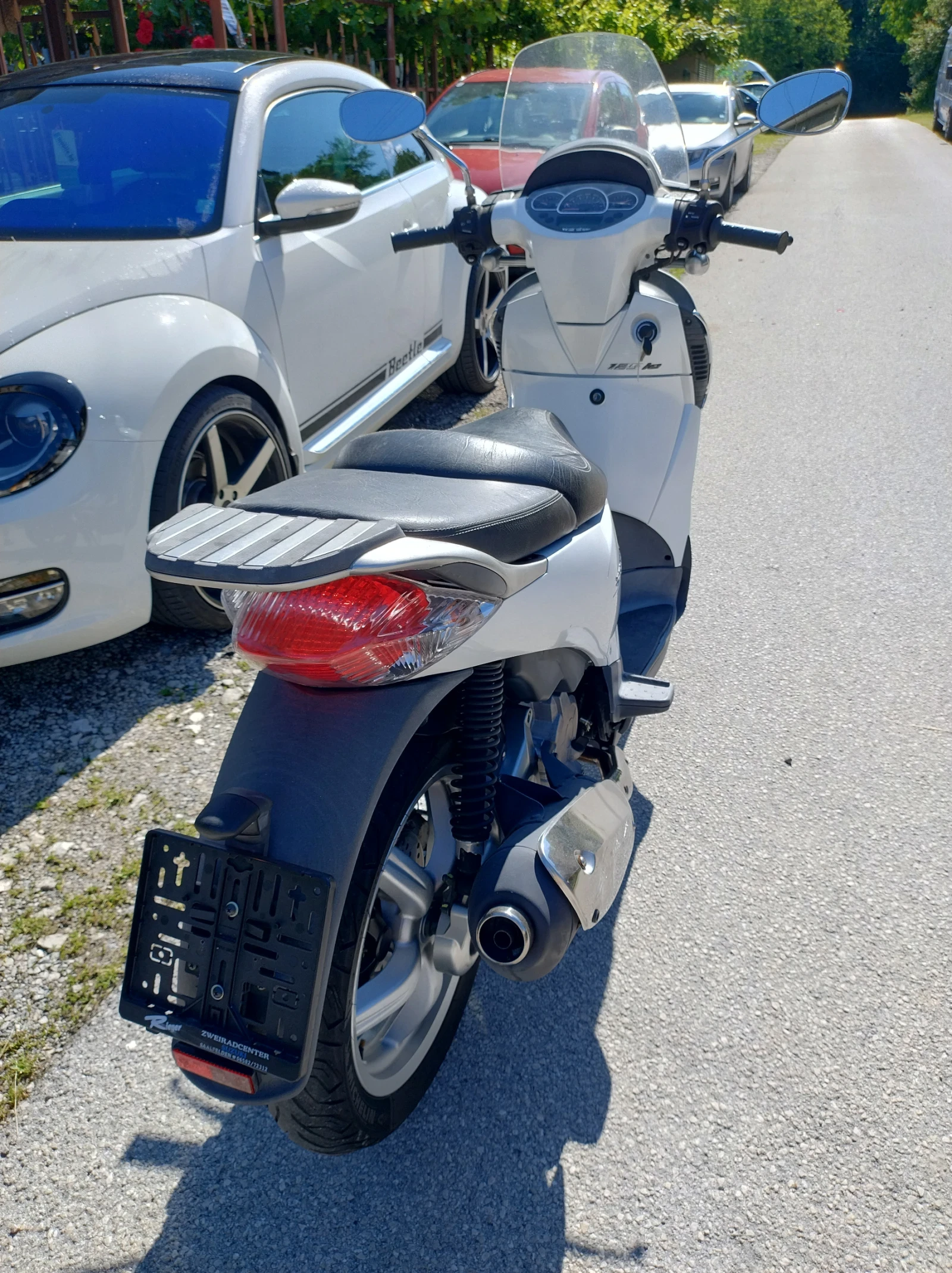 Aprilia Scarabeo 125, i Супер състояние!, снимка 10 - Мотоциклети и мототехника - 54965303