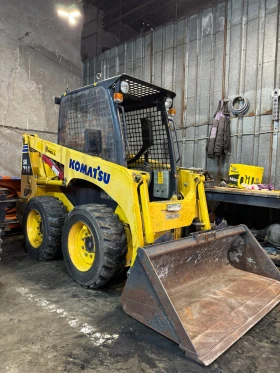 Мини челни товарачи Komatsu SK 714, снимка 1