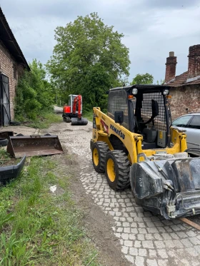 Мини челни товарачи Komatsu SK 714, снимка 2