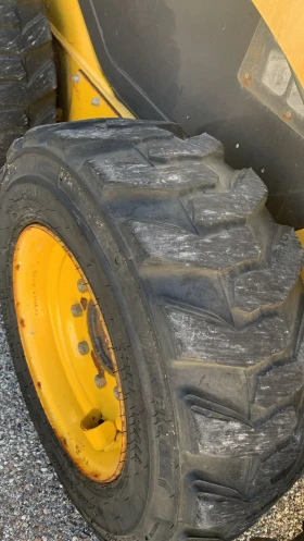 Мини челни товарачи Komatsu SK 714, снимка 8