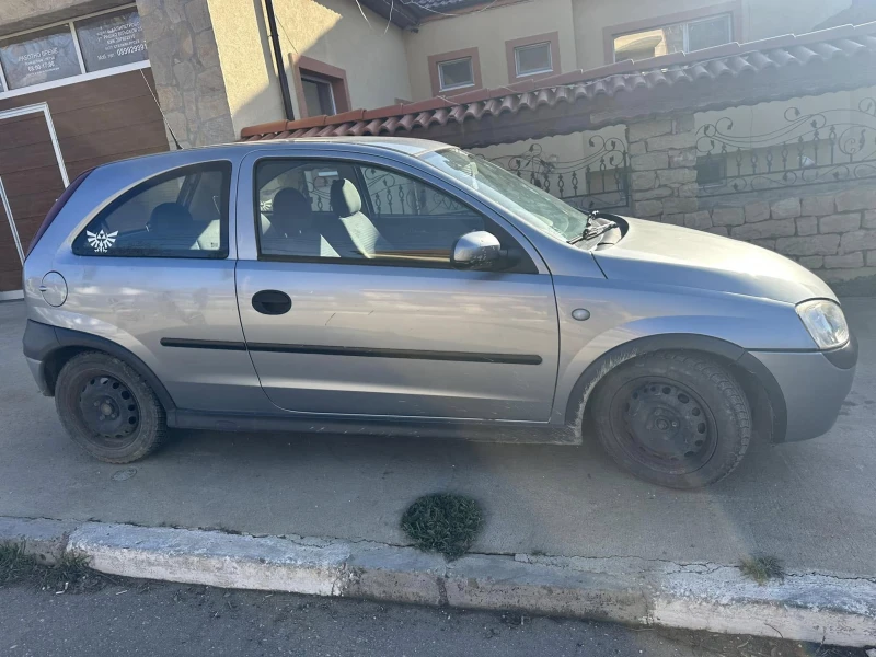 Opel Corsa 1.2i klima, снимка 8 - Автомобили и джипове - 48619318