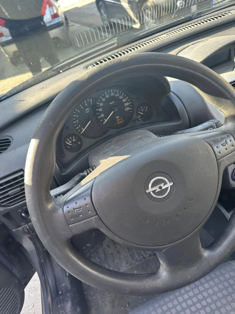 Opel Corsa 1.2i klima, снимка 9 - Автомобили и джипове - 48619318