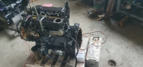 Багер Cat РЕМОНТ, снимка 11