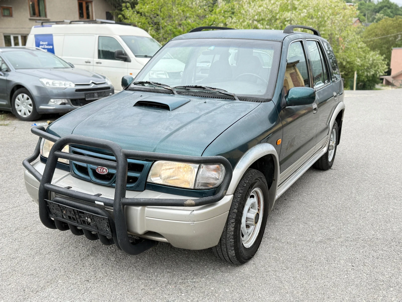 Kia Sportage 2.0TD 4x4/Климатик, снимка 2 - Автомобили и джипове - 54645175