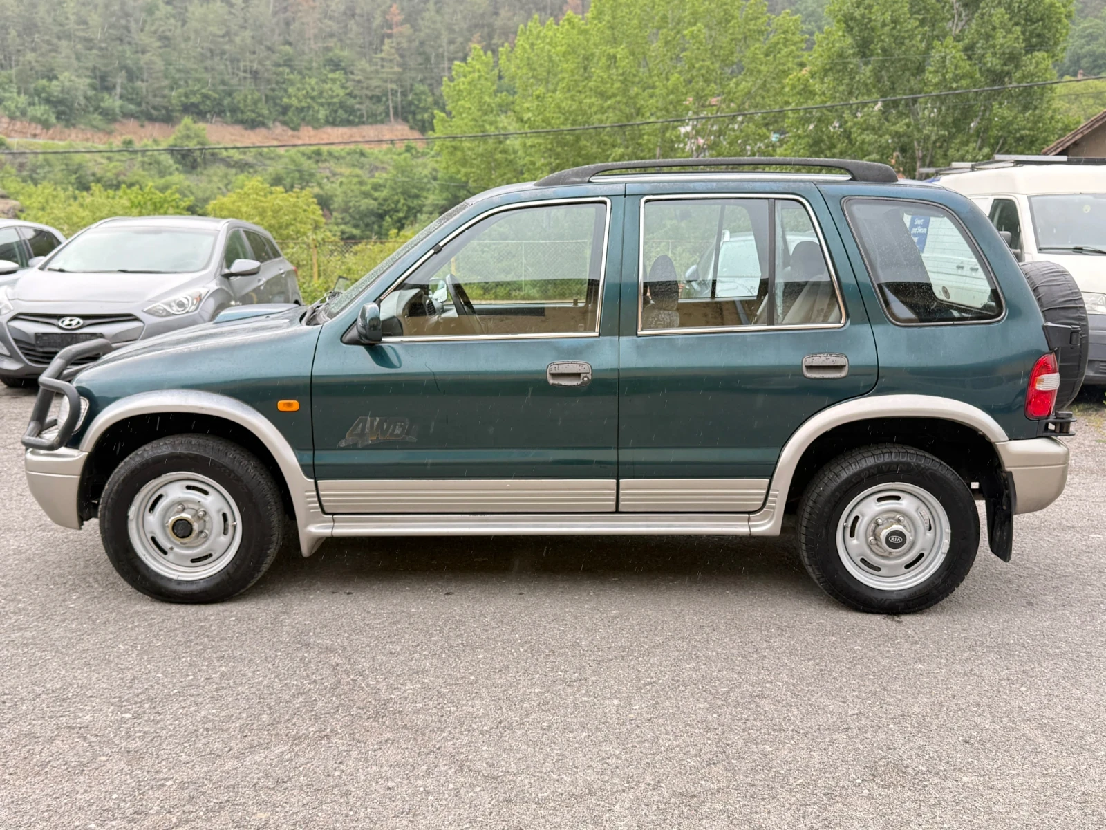 Kia Sportage 2.0TD 4x4/Климатик, снимка 8 - Автомобили и джипове - 54645175