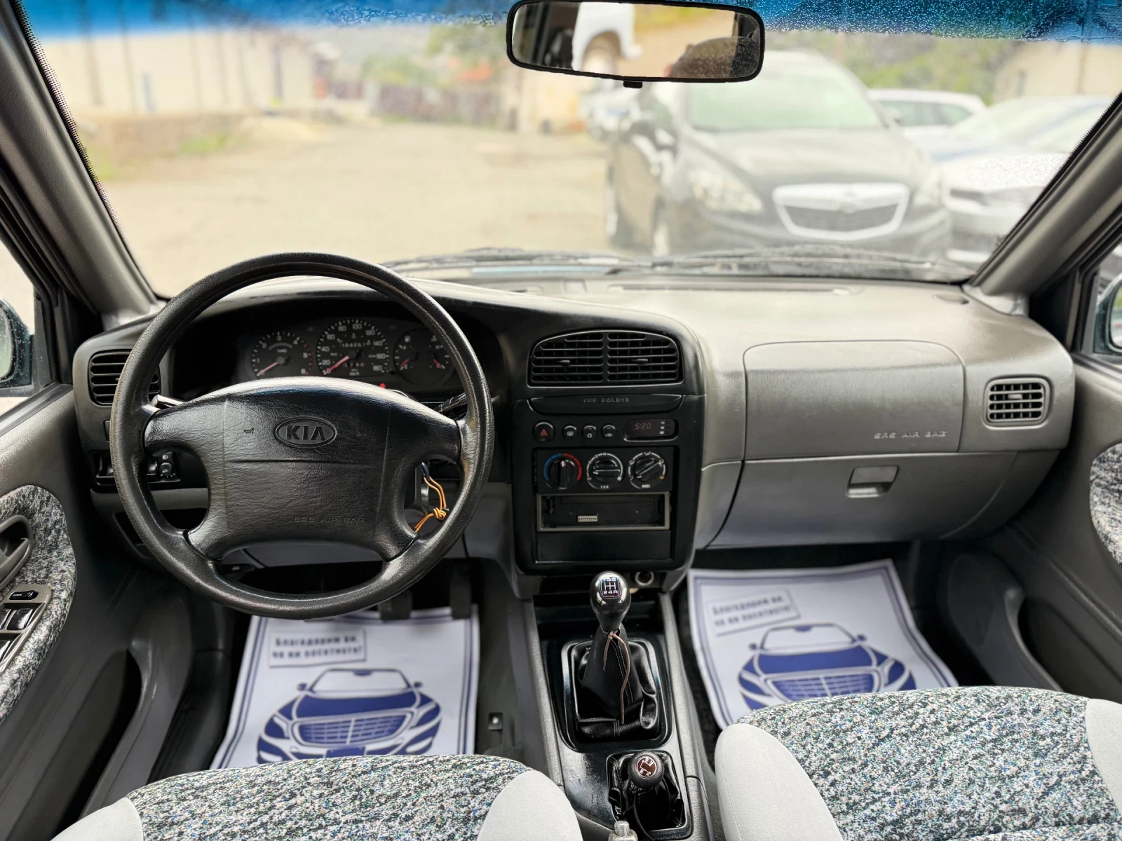 Kia Sportage 2.0TD 4x4/Климатик, снимка 11 - Автомобили и джипове - 54645175