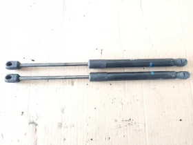 Амортисьори заден капак Пежо 407 комби (к)