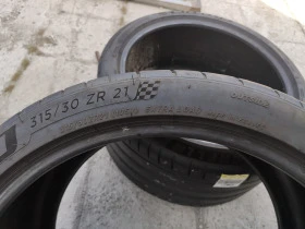 Гуми Летни 315/30R21, снимка 5 - Гуми и джанти - 46483502