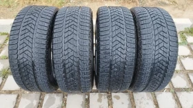 Гуми Зимни 245/45R18, снимка 1 - Гуми и джанти - 47404429