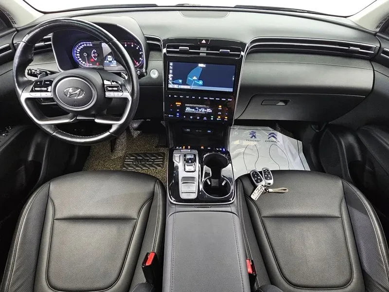 Hyundai Tucson Diesel 2.0 2Wd Premium, снимка 7 - Автомобили и джипове - 55616135