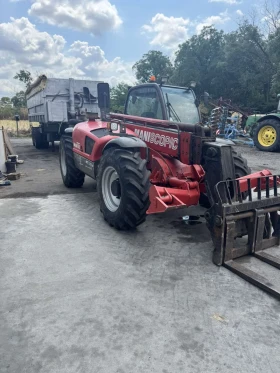 Телескопичен товарач Manitou, снимка 1