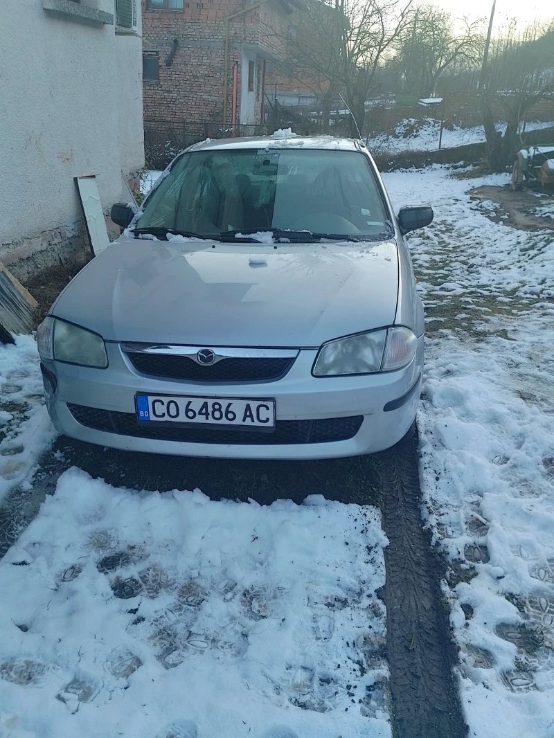 Mazda 323, снимка 1 - Автомобили и джипове - 48435319