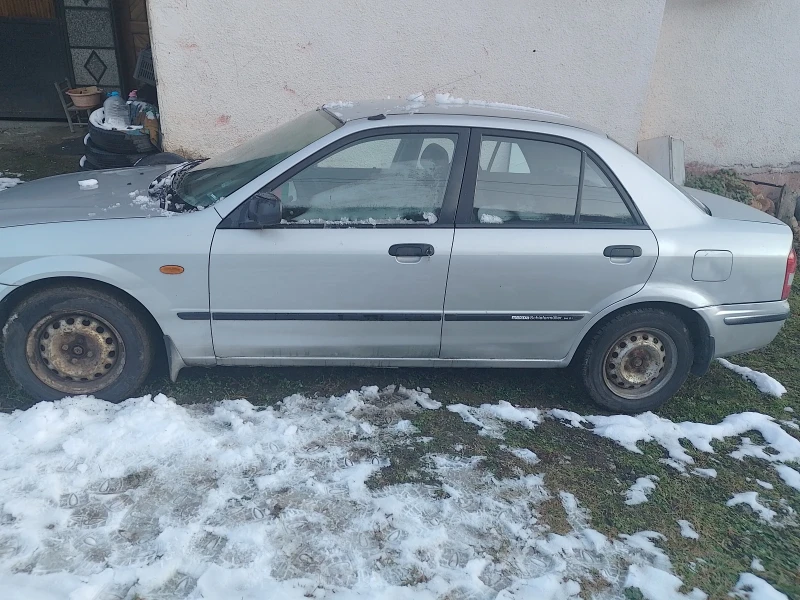 Mazda 323, снимка 5 - Автомобили и джипове - 48435319