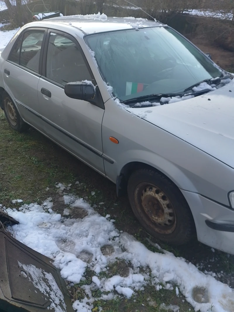 Mazda 323, снимка 2 - Автомобили и джипове - 48435319